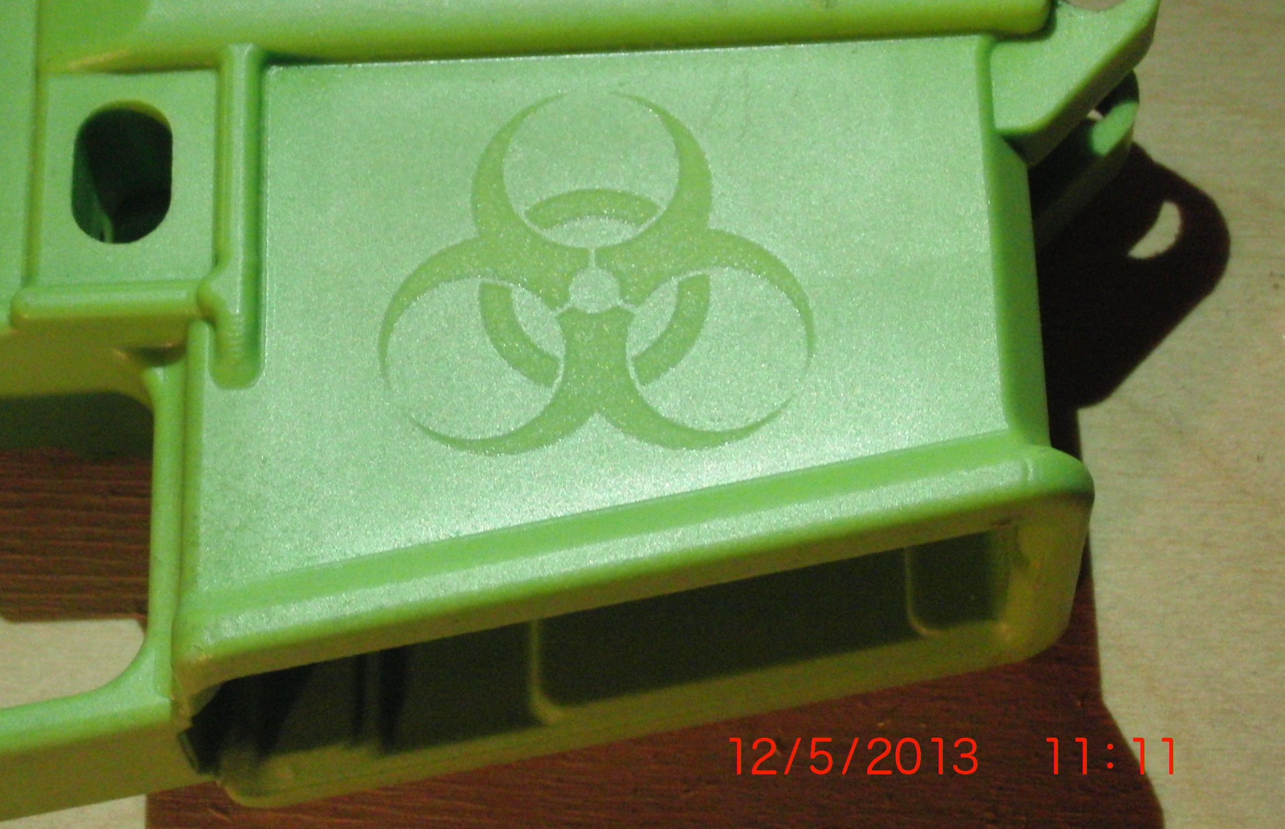 Laser
                                                          Engraving of
                                                          Zombie
                                                          BioHazard Logo
                                                          on EP Lower.